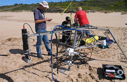 Mounting instruments on the tripod frame at Durras Beach.